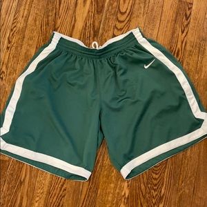 Large green Nike basketball shorts